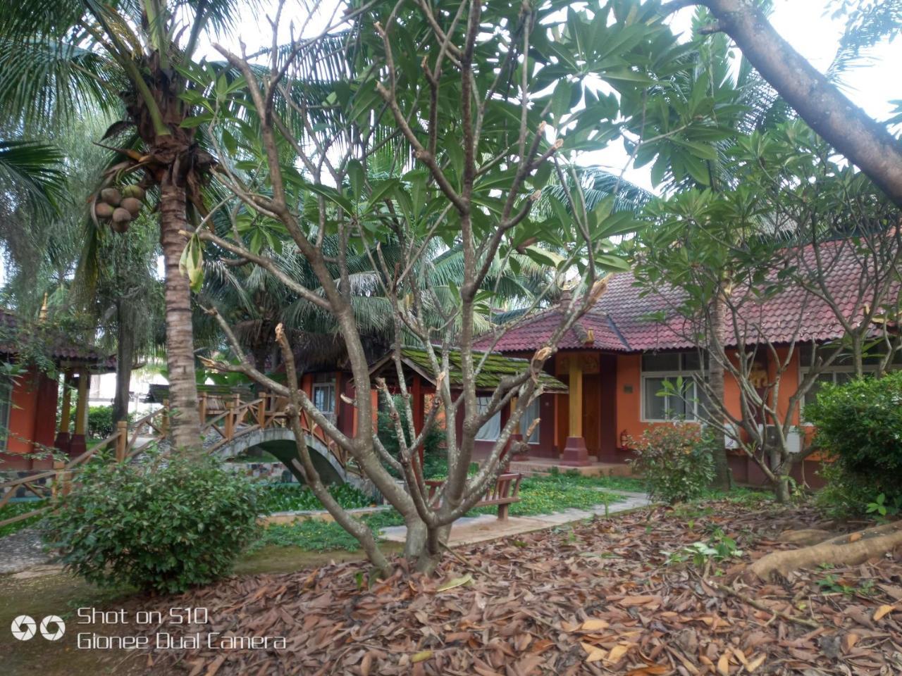 Xishuangbanna Daile Villa Hotel Jinghong Exterior photo